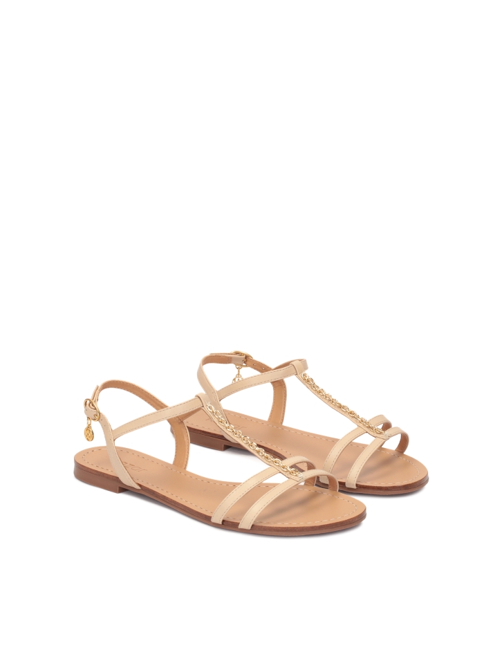Beige leather sandals with ankle straps