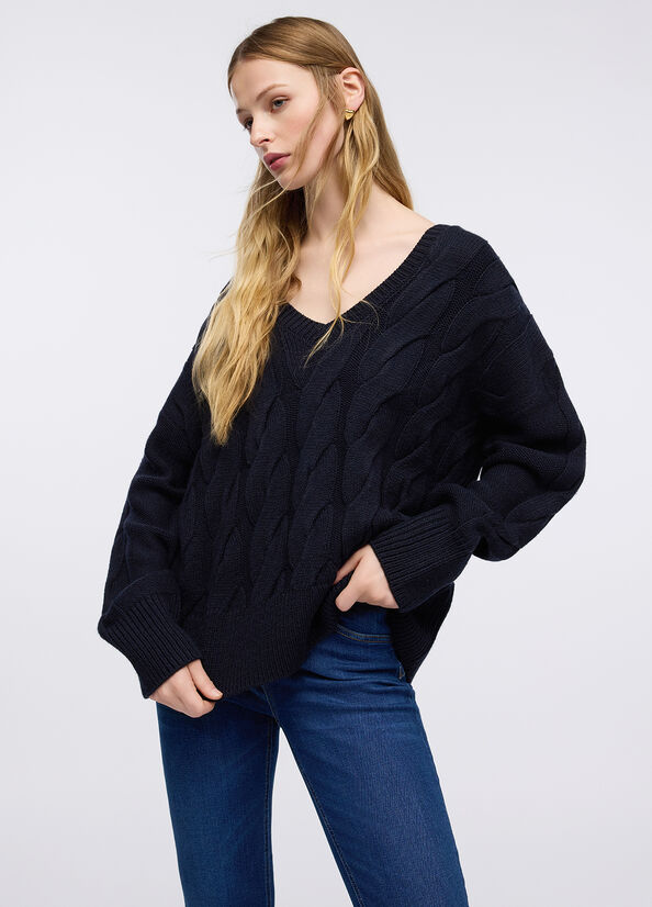 Maglione in lana a trecce