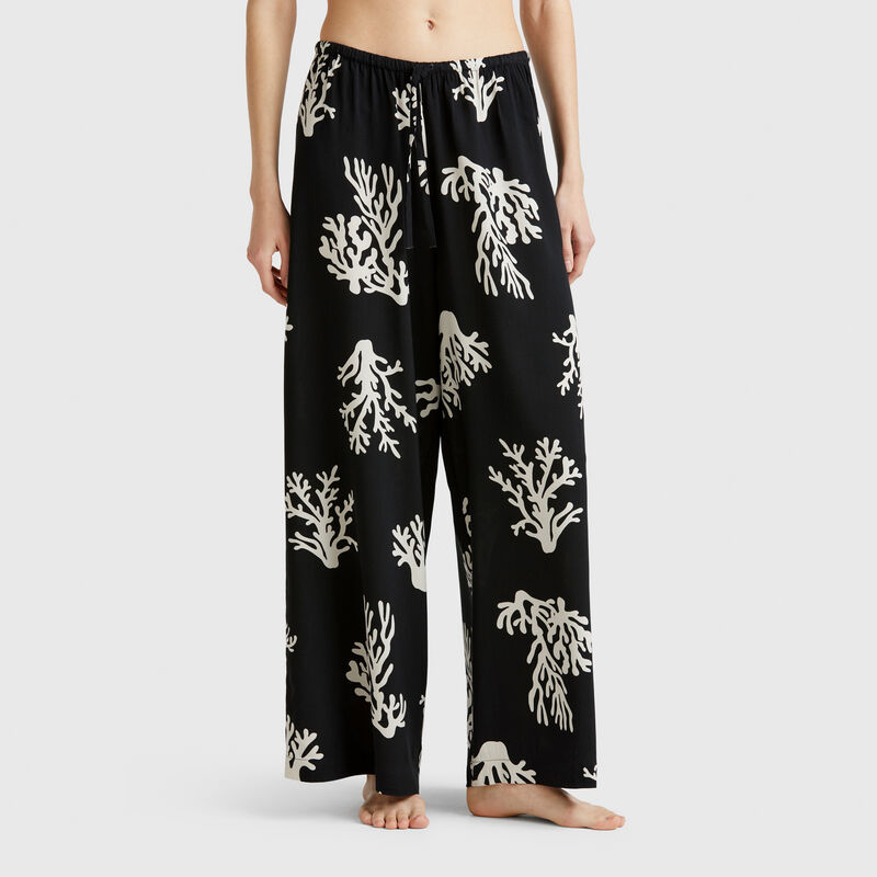 Trousers with coral print