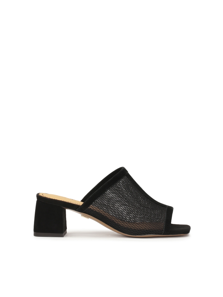 Black mesh mules on a low post
