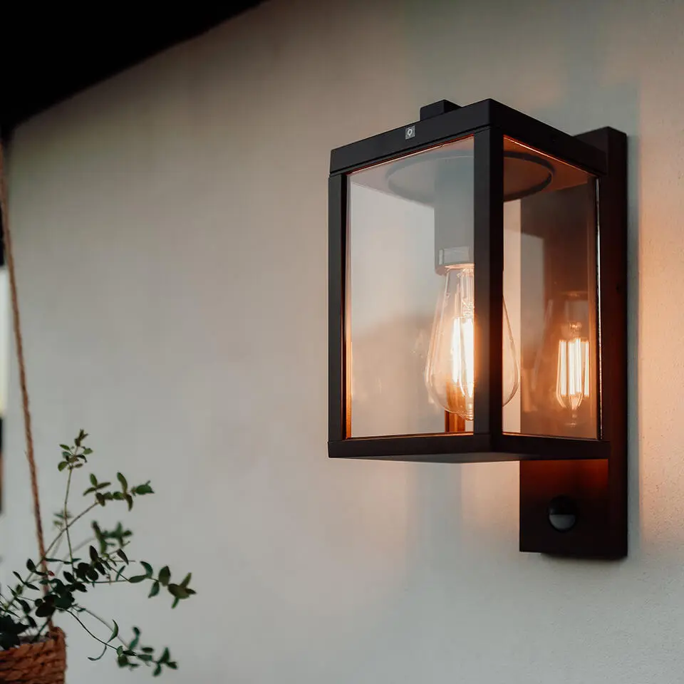 Qazqa wandlamp met daglichtsensor charlois bruin e27