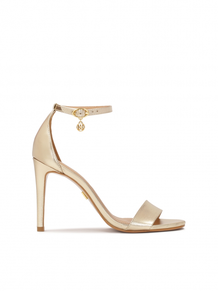 Gold sandals with a built-in heel