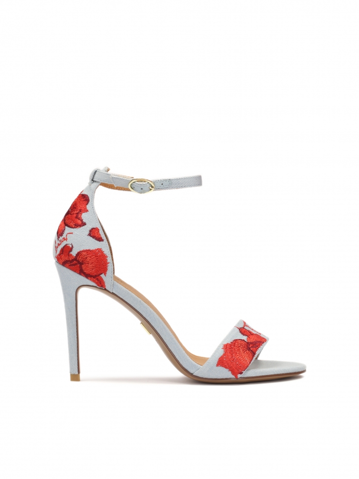 Blue sandals with red flowers