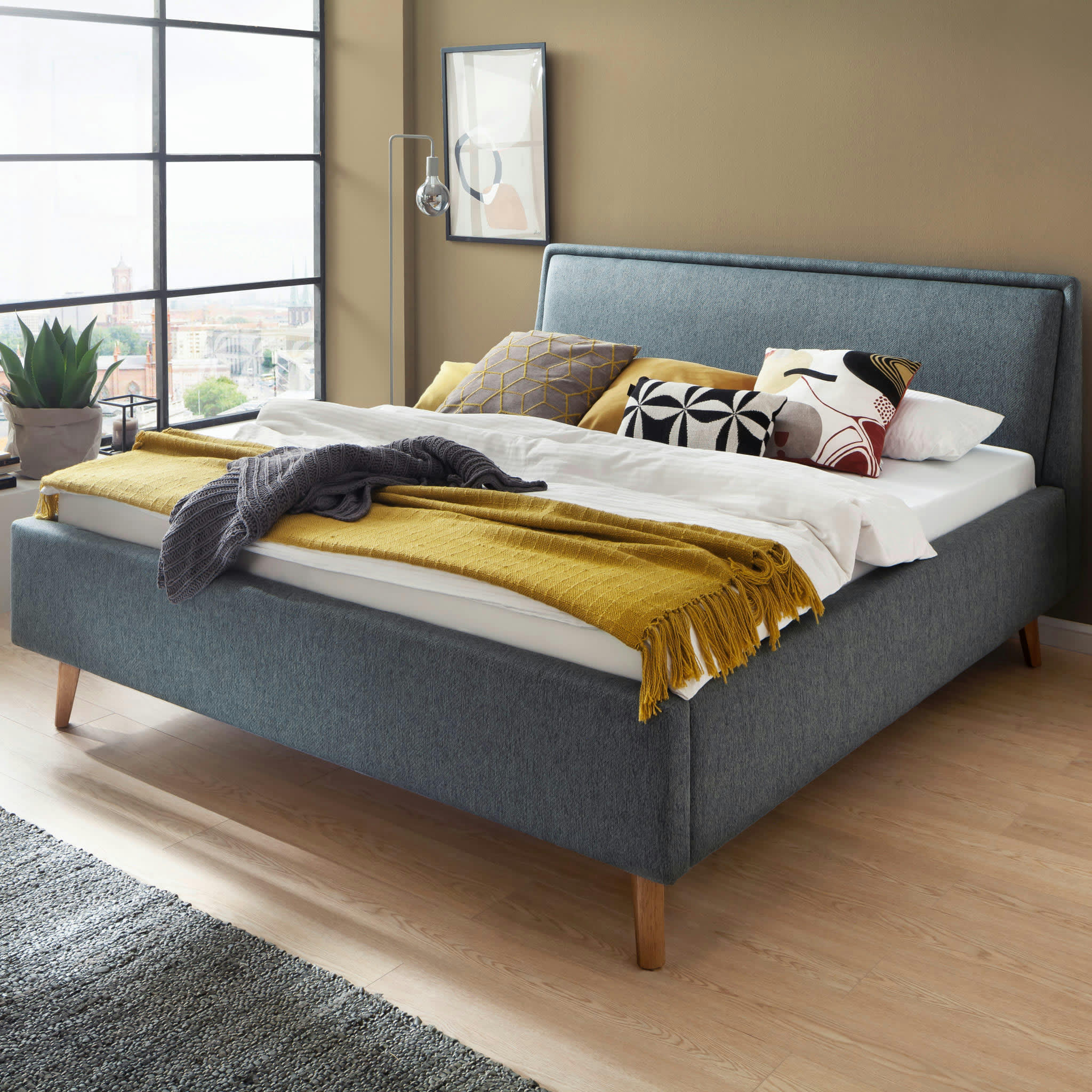 - Lit rembourré en tissu avec tête de lit lisse bleu 140x200