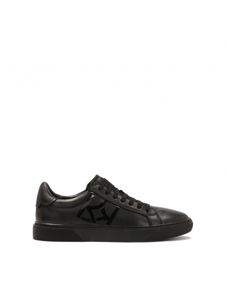 Black sneakers with large KAZAR monogram
