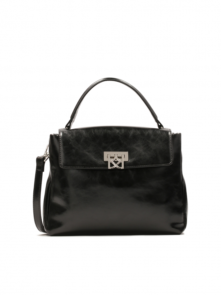 Leather handbag with decorative clasp