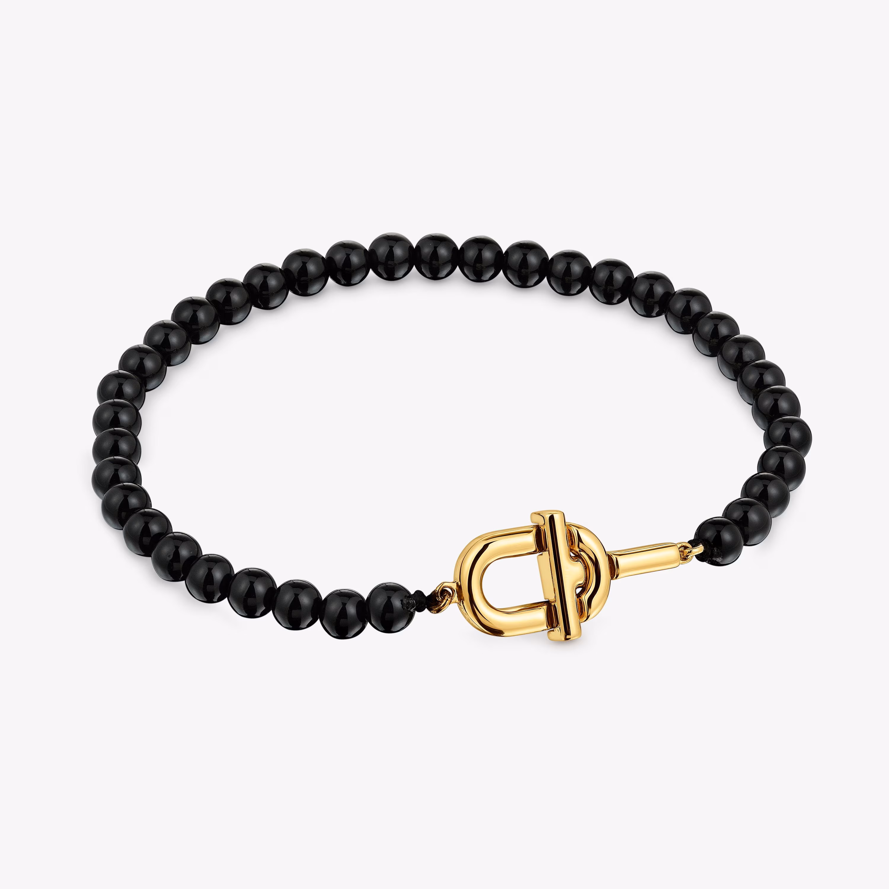 Pulsera con baño de oro 18 kt sobre plata y ónix TOUS MANIFESTO