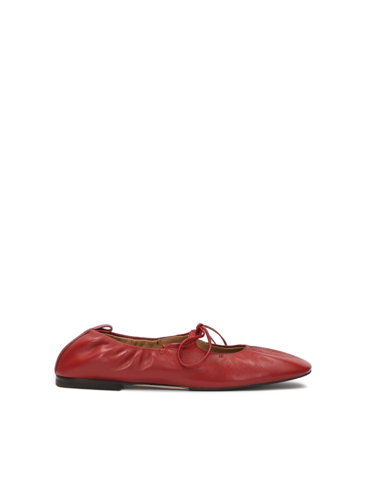 Tiered red ballerinas on a leather sole