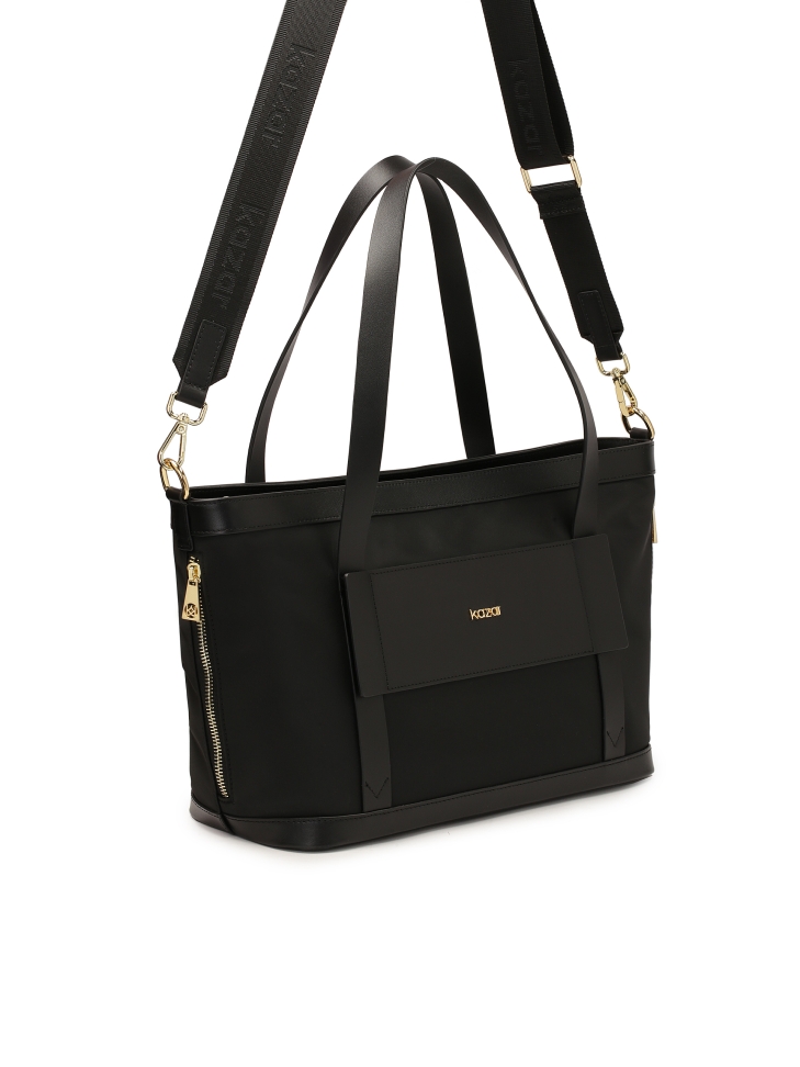 Handbag in fabric and leather with handles and strap