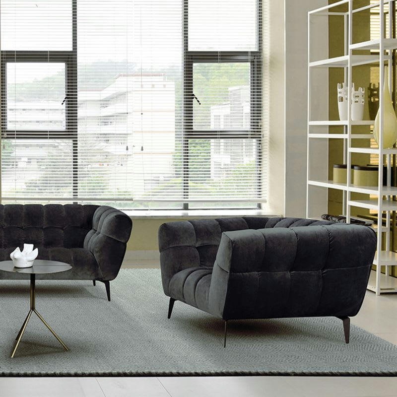 BRIO - Fauteuil velours gris capitonné avec piètement métal noir