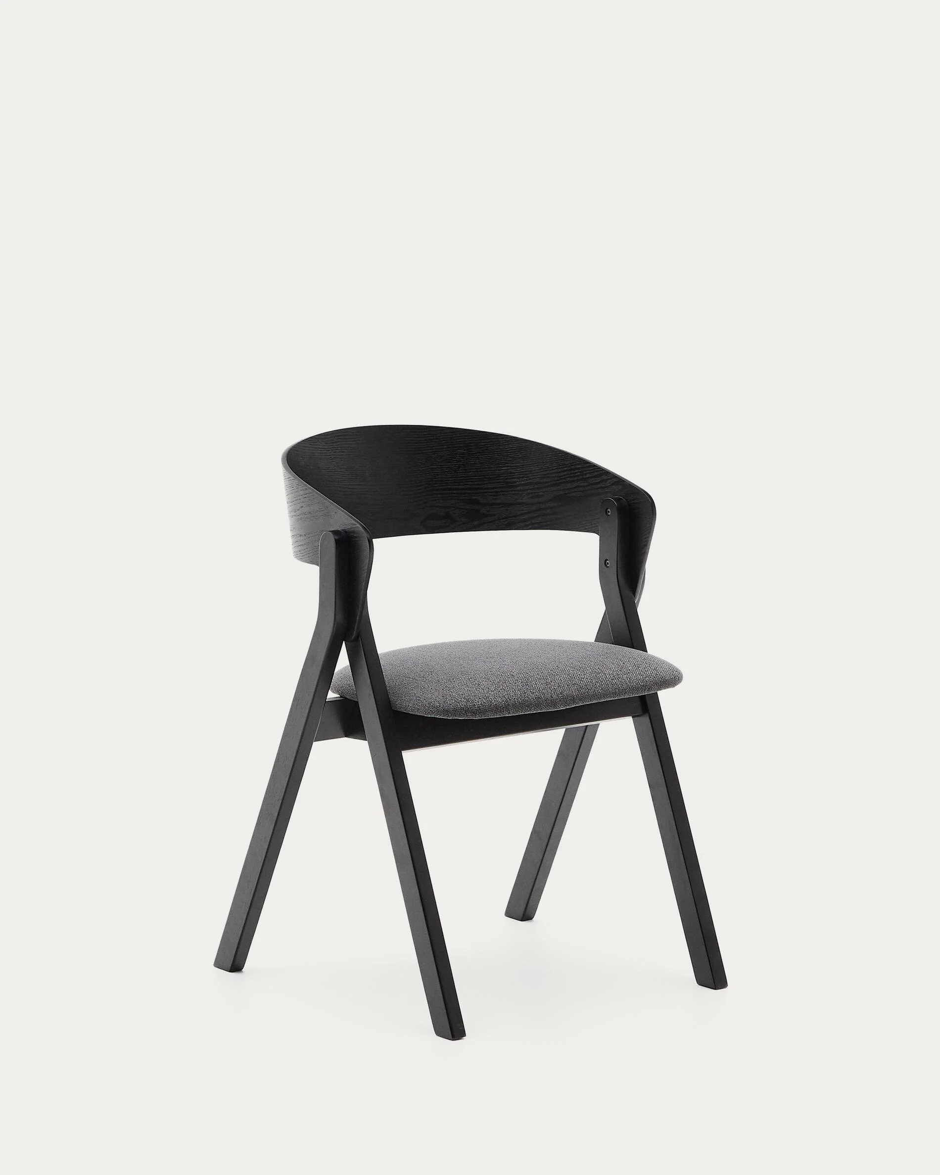 Godia chair in ash veneer with a black finish and grey chenille