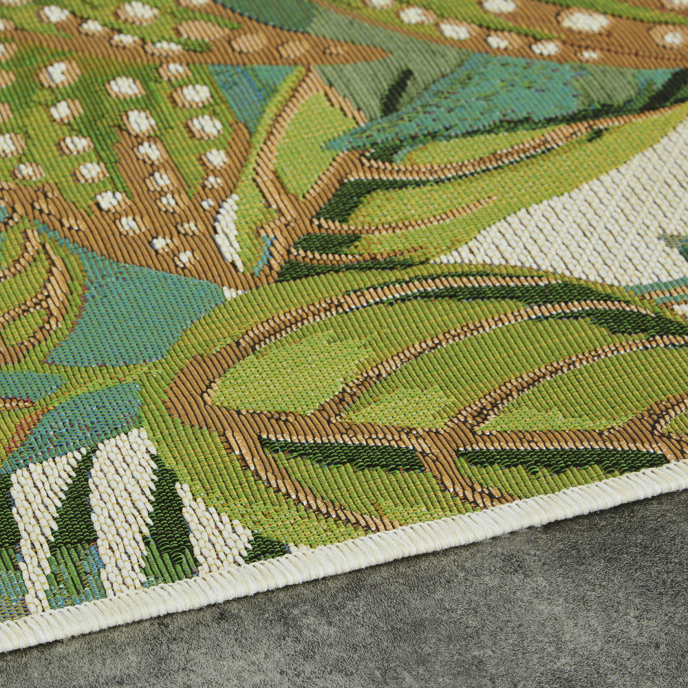 HOANI - Tapis tissé jacquard imprimé jungle écru, bleu et vert 160x230