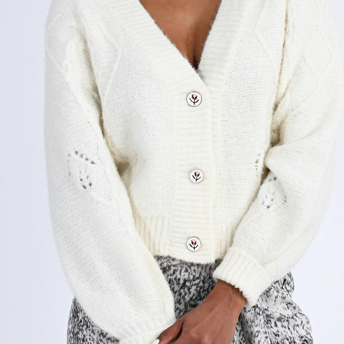 Gilet court manches bouffantes, boutons fantaisie