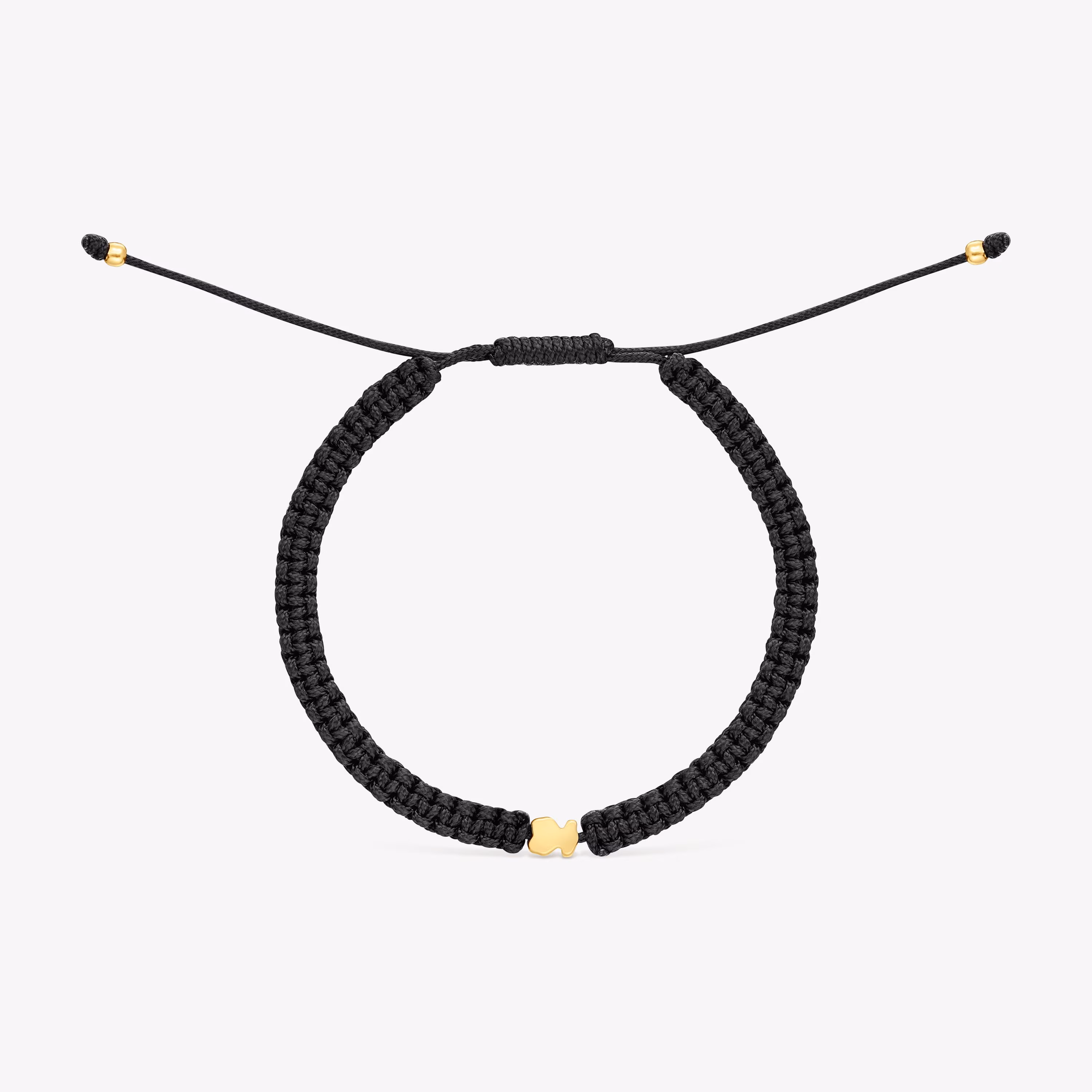 Pulsera oso con baño de oro 18 kt sobre plata y nylon negro TOUS Motivos