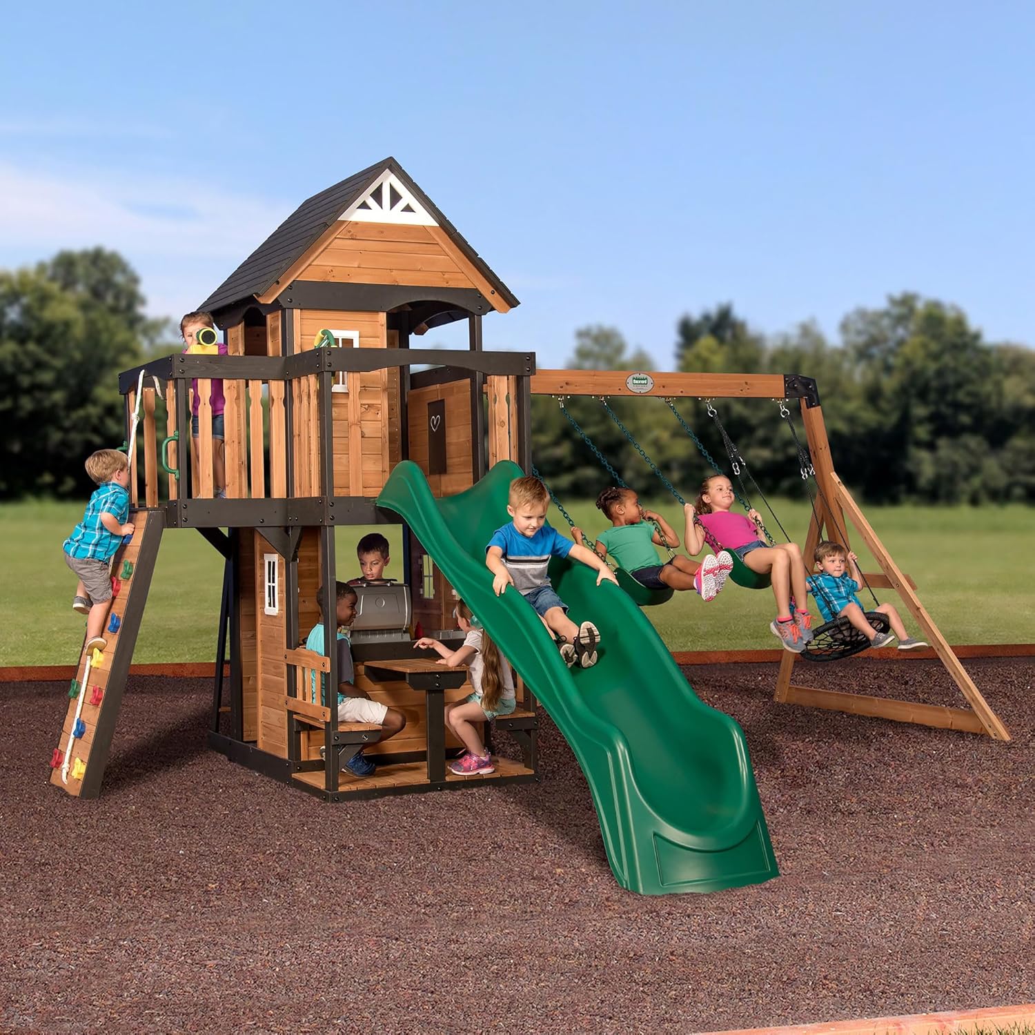 Backyard Discovery Canyon Creek Cedar Wood Swing Set with Wave Slide, Clubhouse, Play Kitchen, Picnic Area, Belt Swings, Web Swing, Rock Wall, Balconies, Playhouse, Step Ladder, Outdoor Playset(Green Slide)