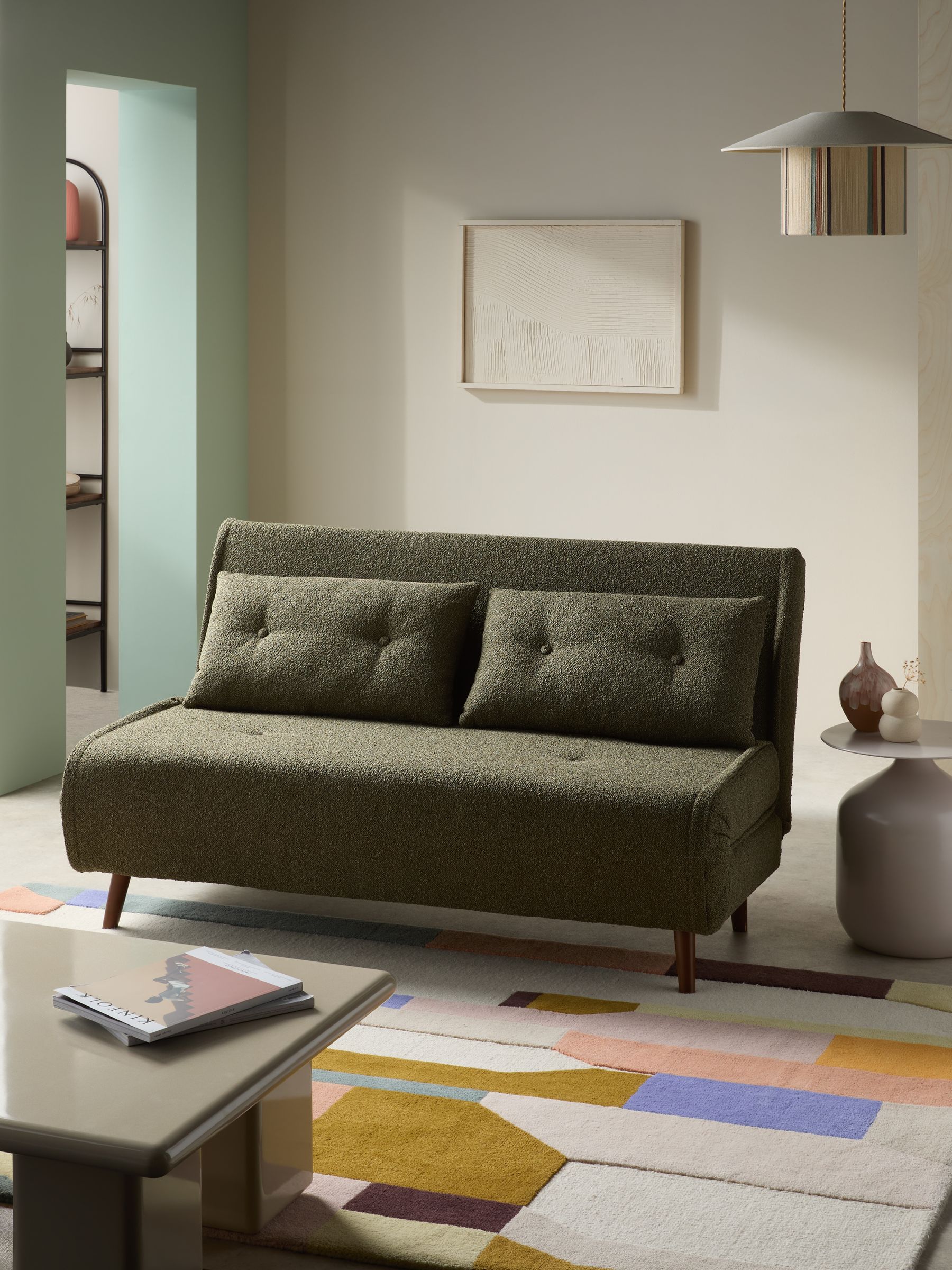 Large Haru 2 Seater Sofa Bed in Forrest Green Pax Boucle
