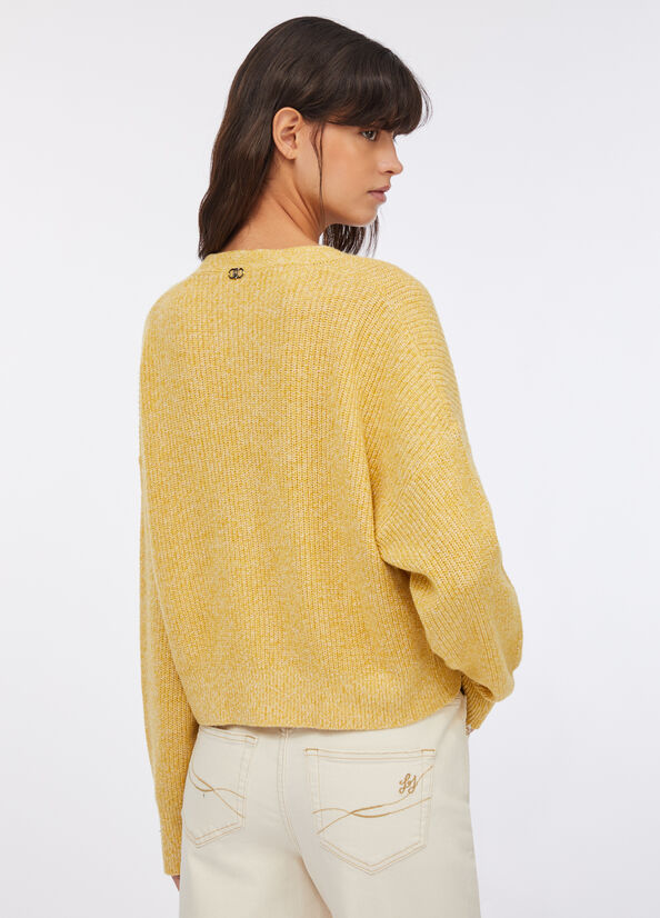Cardigan con bottoni gioiello