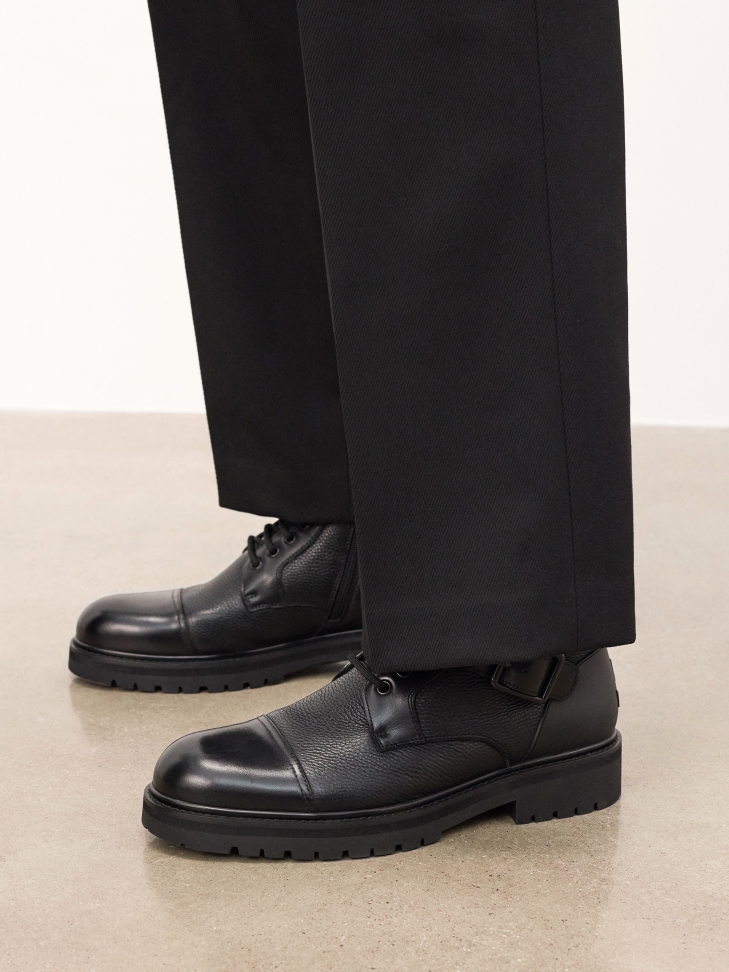 Black leather men's boots with buckles and lace-up upper