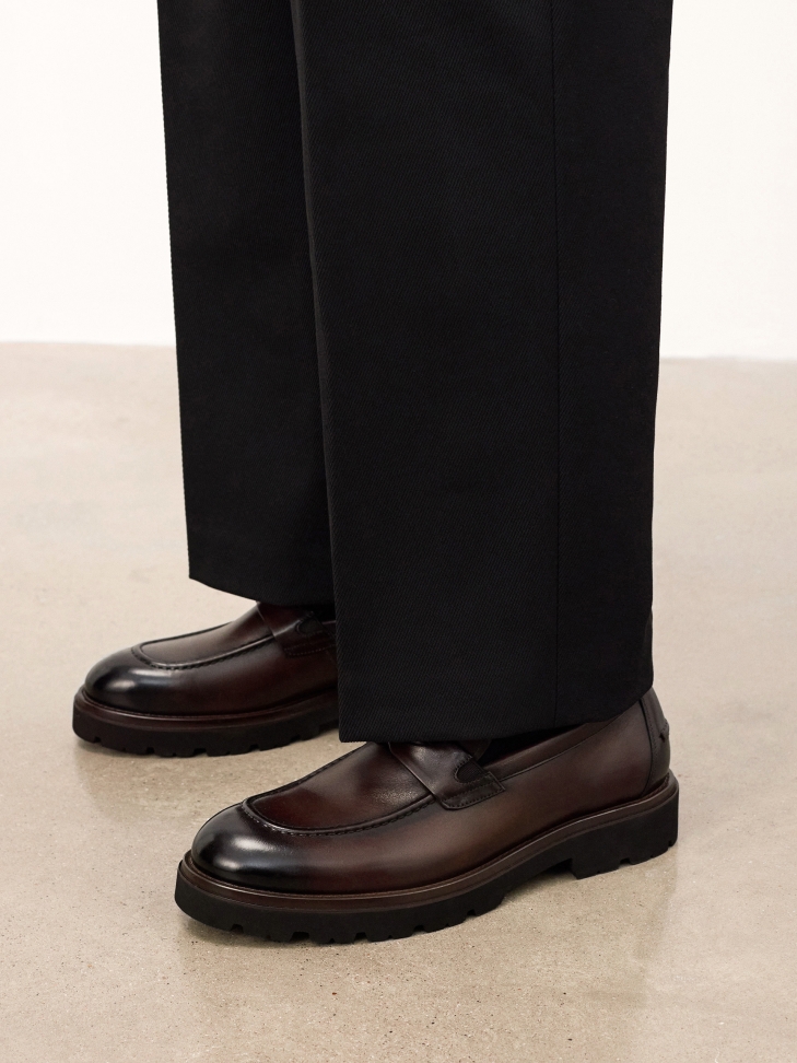 Slip-on shoes on a thick sole