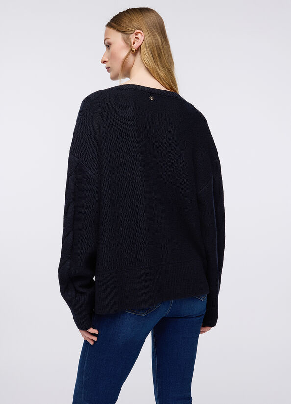 Maglione in lana a trecce