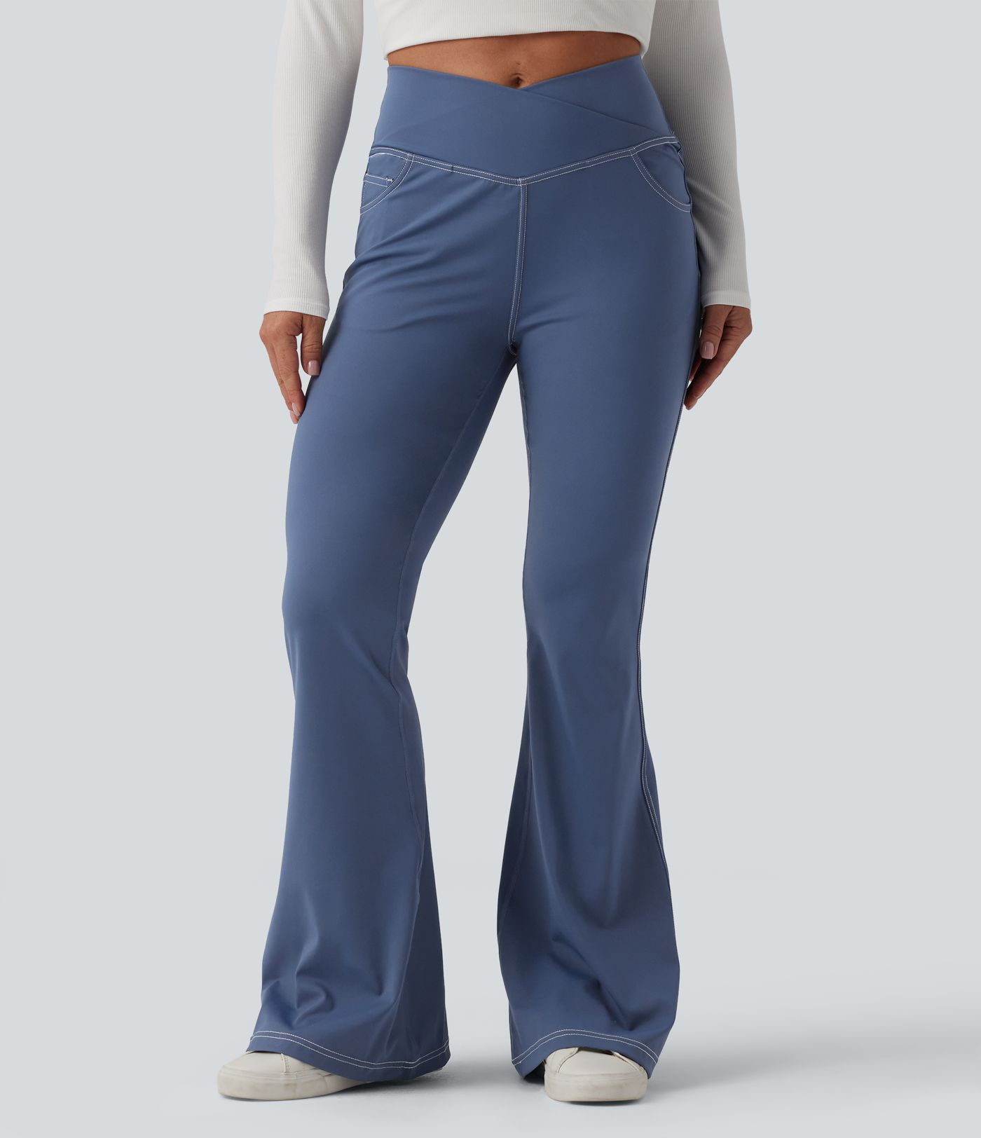 Legging super flare taille mi-haute croisée avec poches
