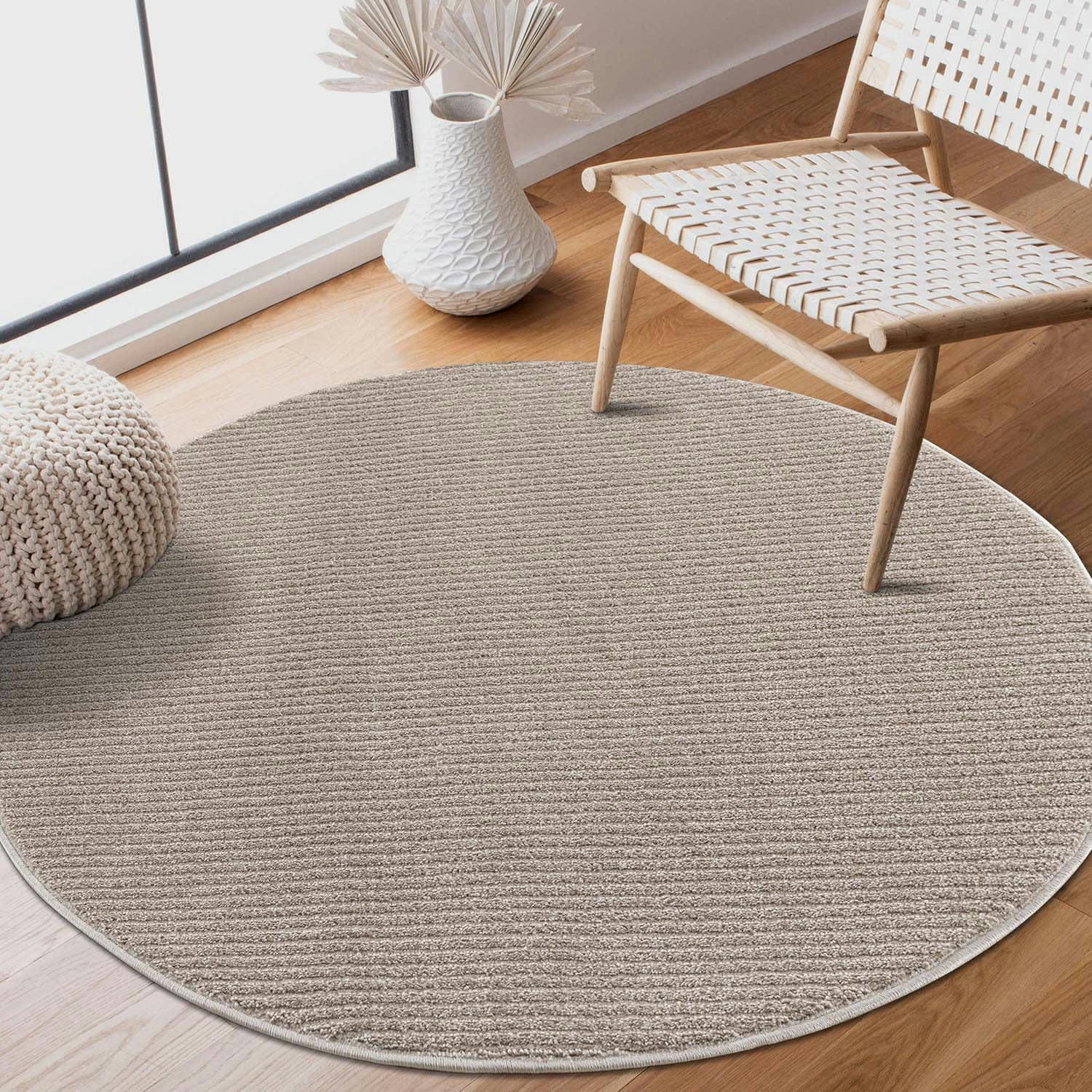 TARA - Tapis rond uni beige à relief linéaire 160x160cm
