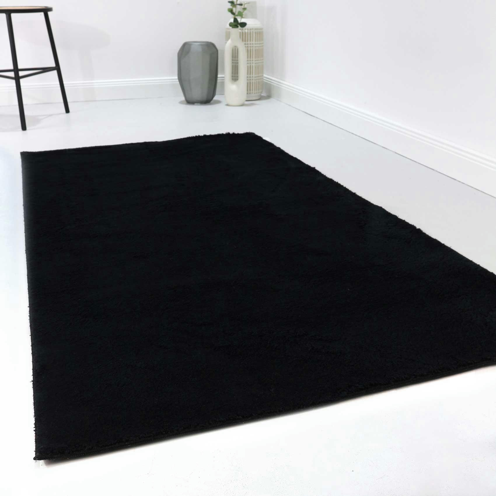 LAGO - Tapis tufté mèches rases noir 133x200