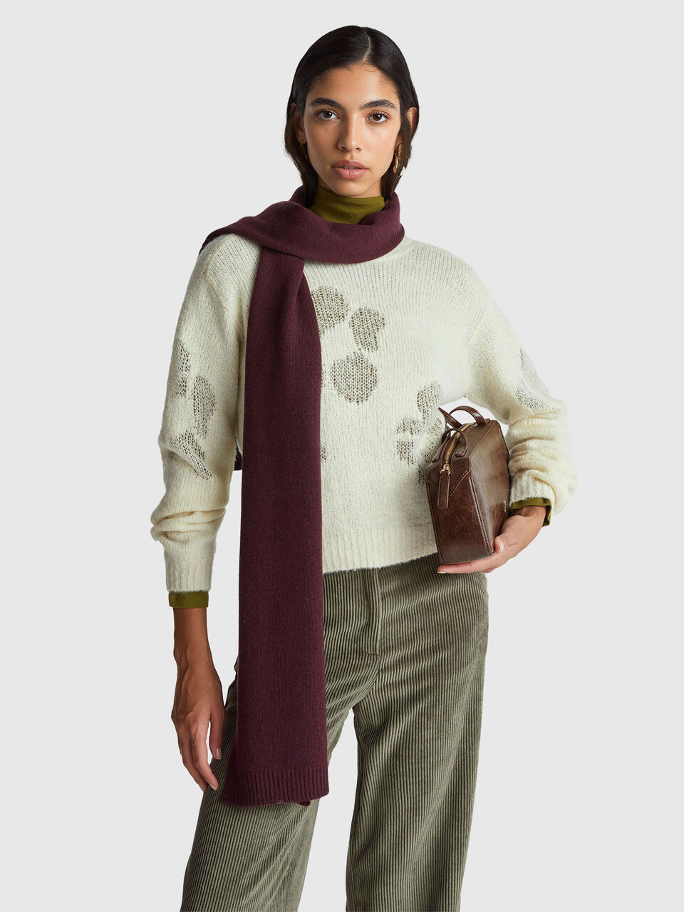 Sweater with floral inlay