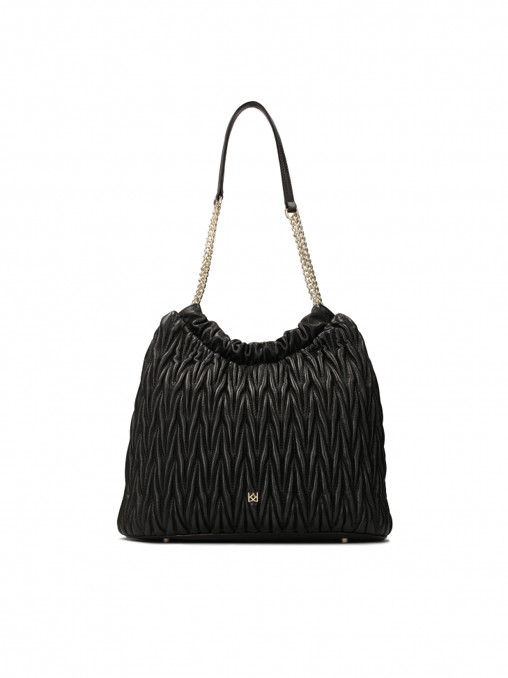 Black quilted bag-shaped handbag