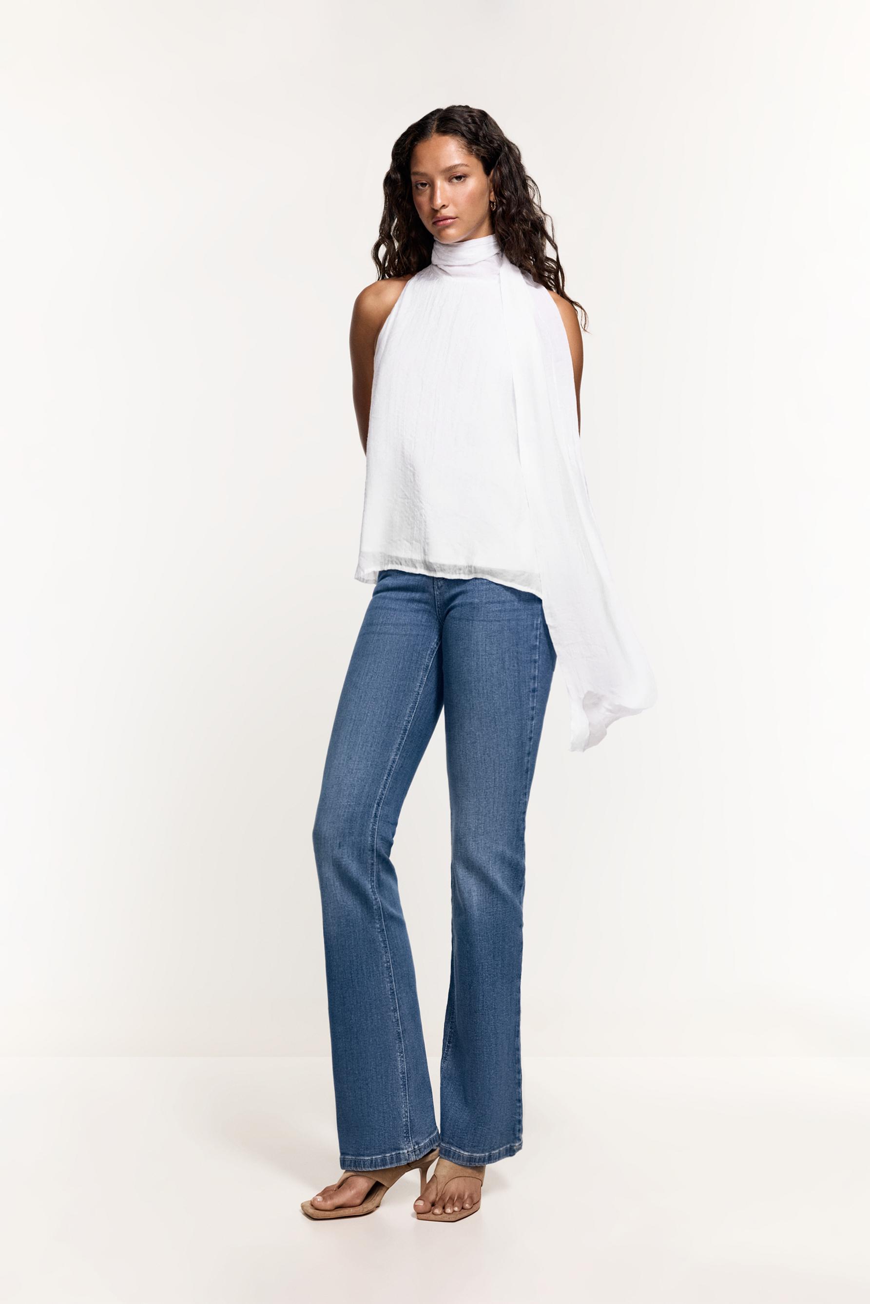 Jeans flare doble botón