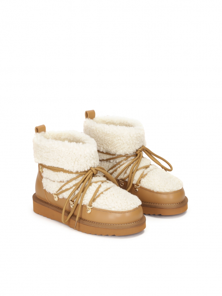 Brown and cream women's snow boots