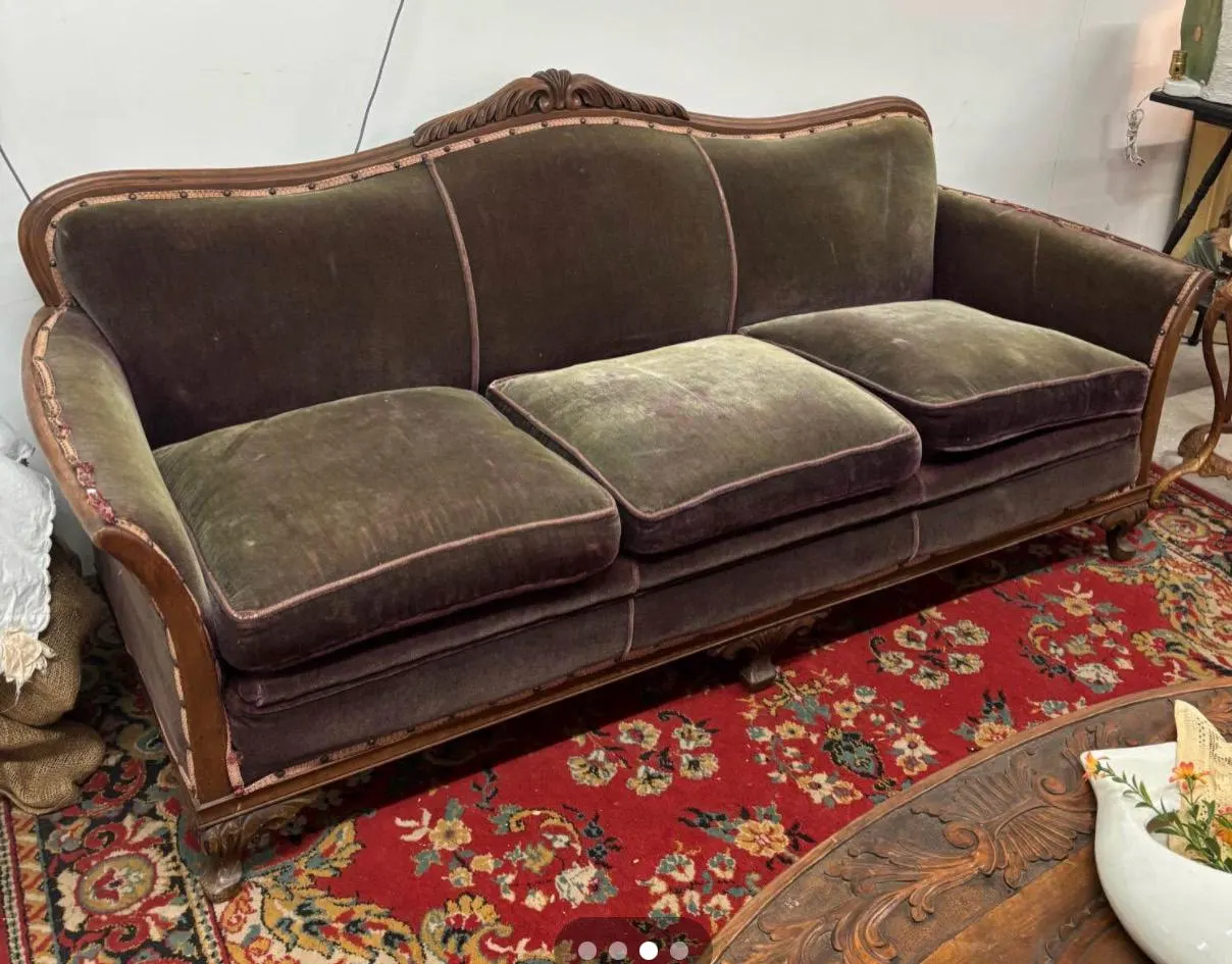 Authentic 3 seeter sofa from the 1920’s made out of solid mohagony with ORIGINAL green upholstery.