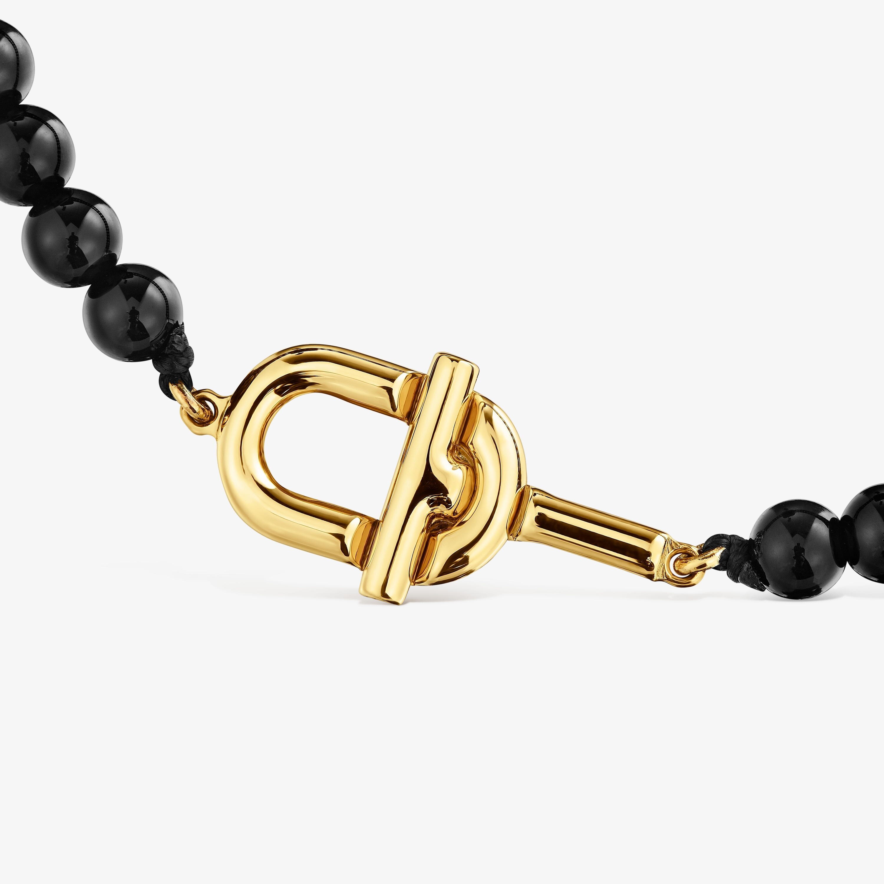 Pulsera con baño de oro 18 kt sobre plata y ónix TOUS MANIFESTO