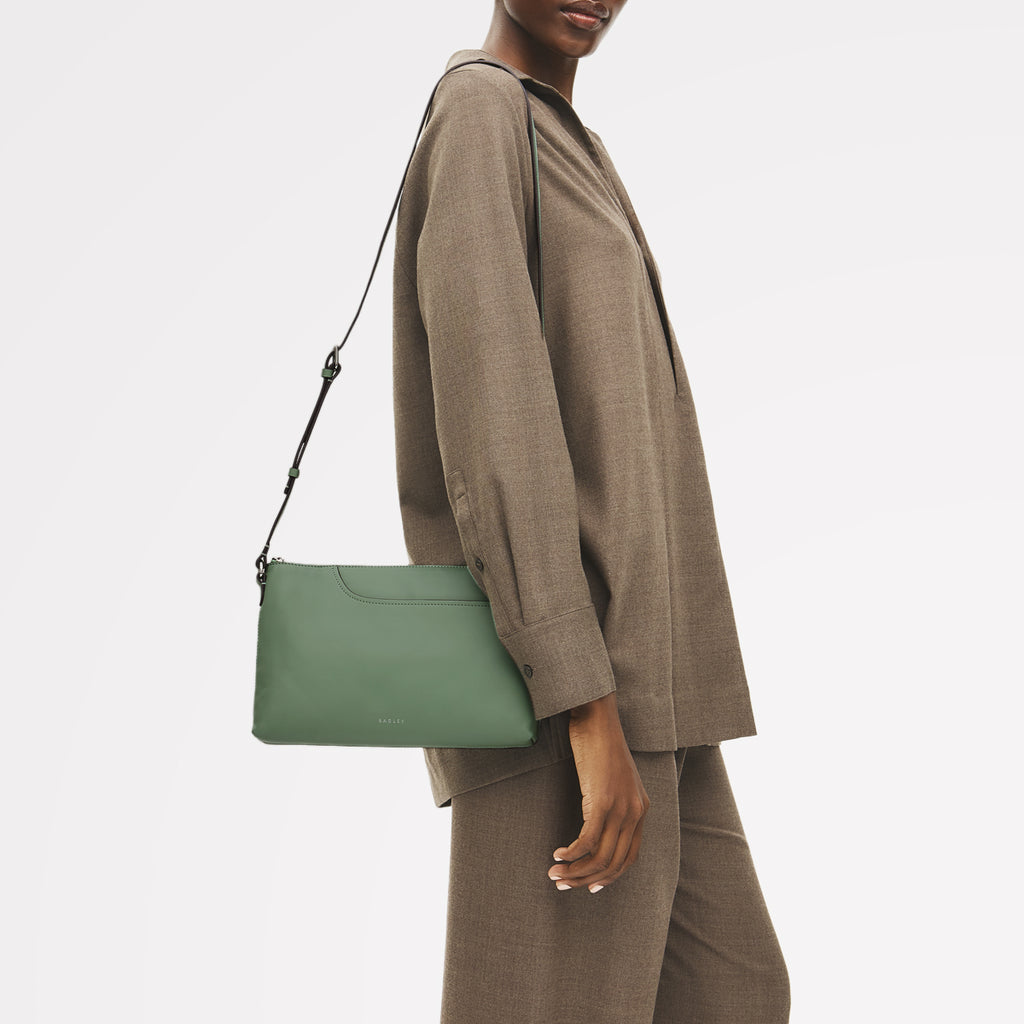 Pockets - Medium Ziptop East-West Cross Body Bag