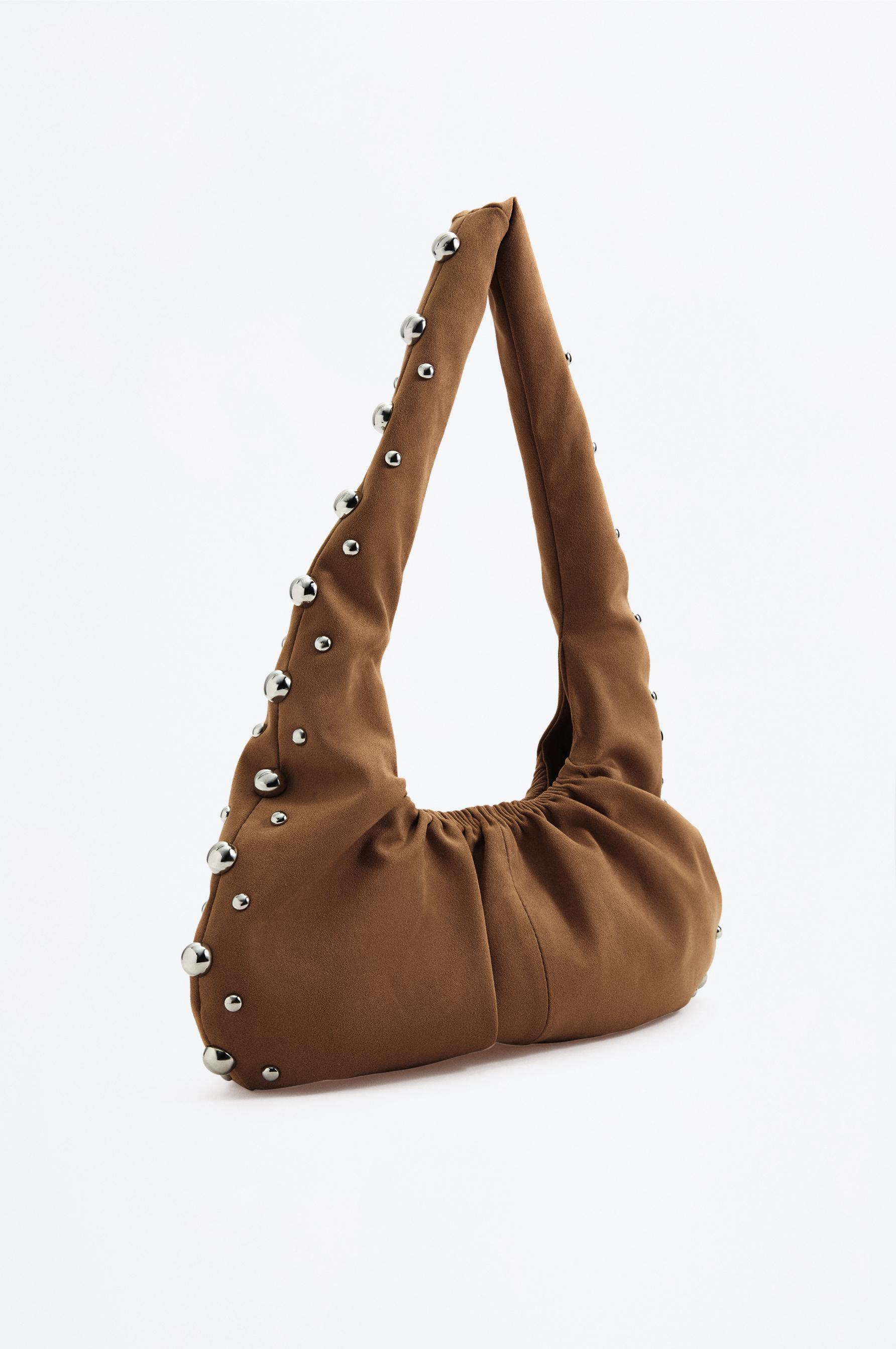 Bolso hombro efecto ante tachas