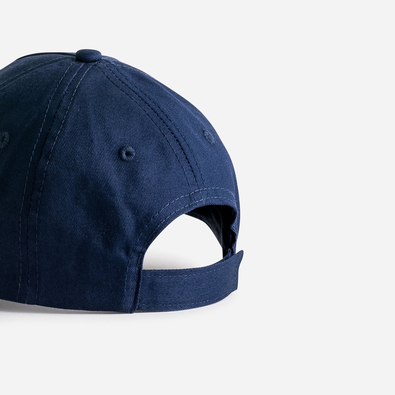 Casquette marine à visière ocre avec dino
