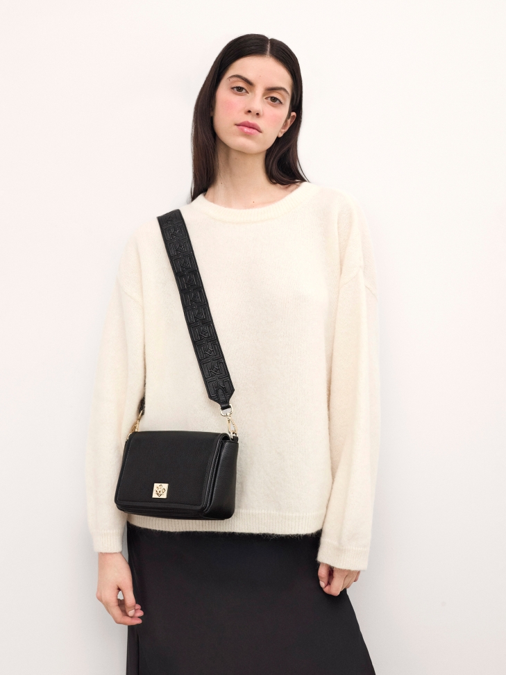 Small black leather handbag with flap