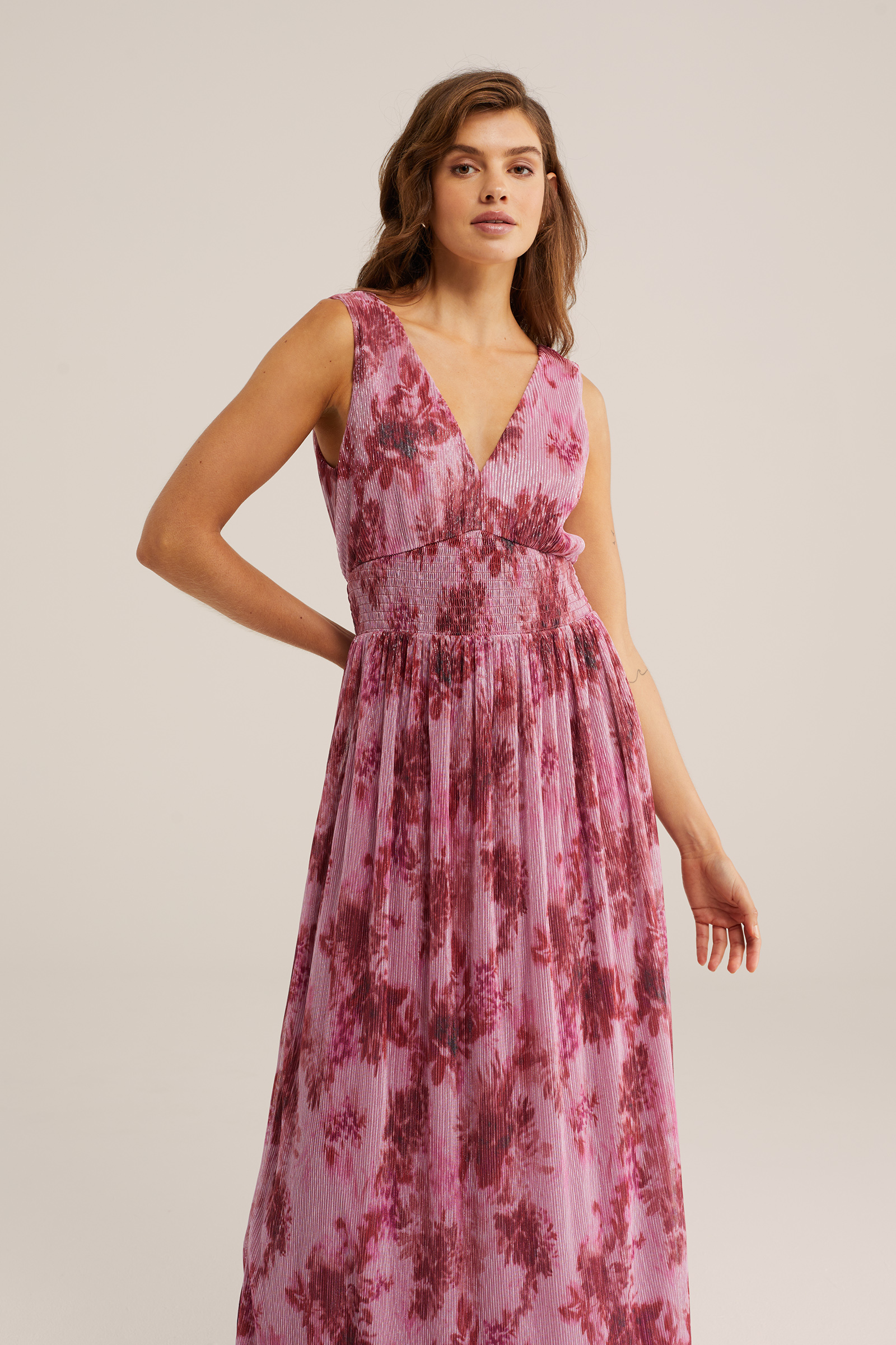 Dames jurk met glittergaren en smokdetail