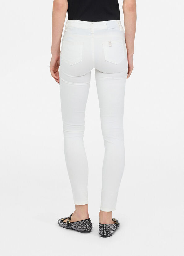 Pantaloni skinny a vita alta