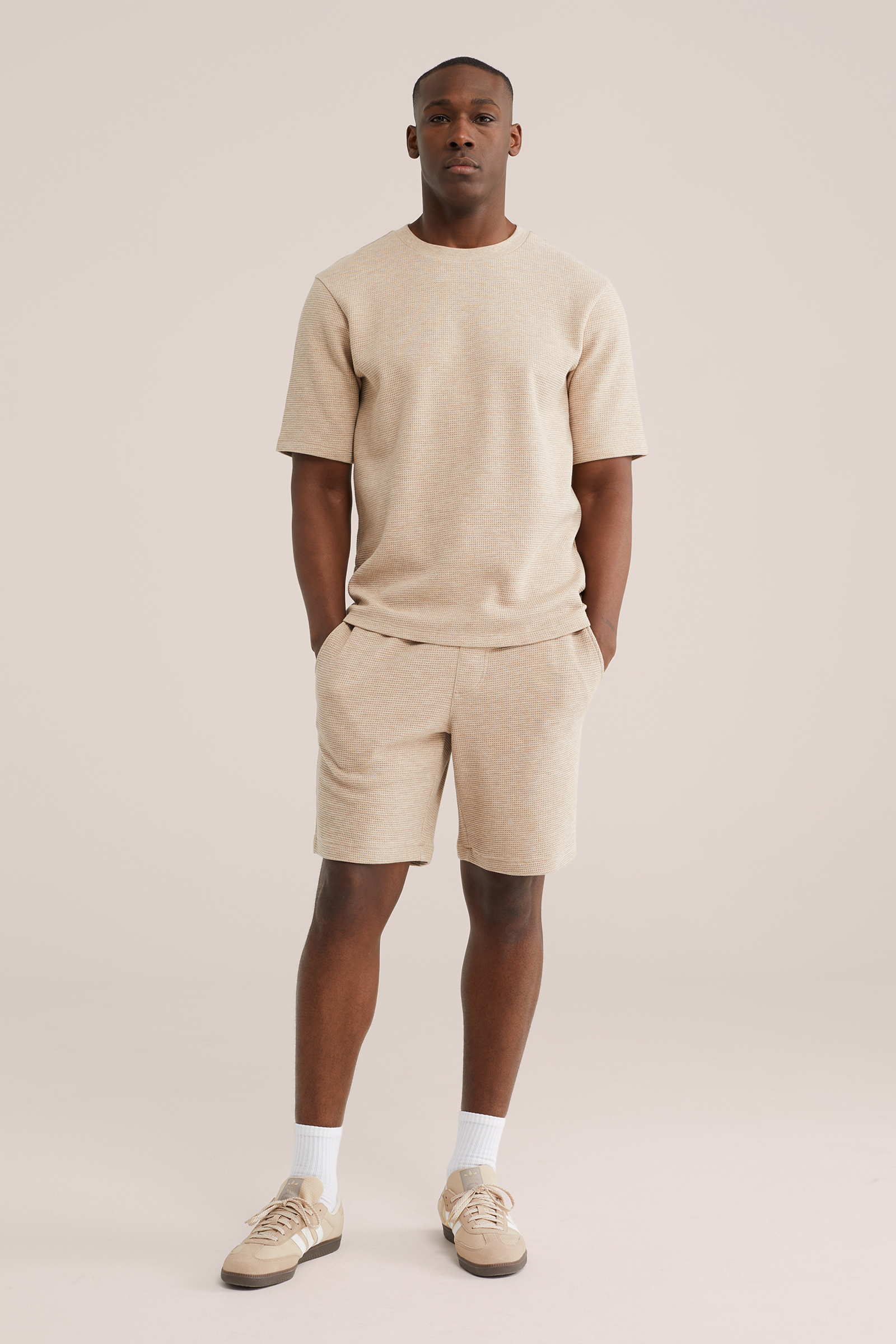 Heren relaxed fit sweat short met structuur