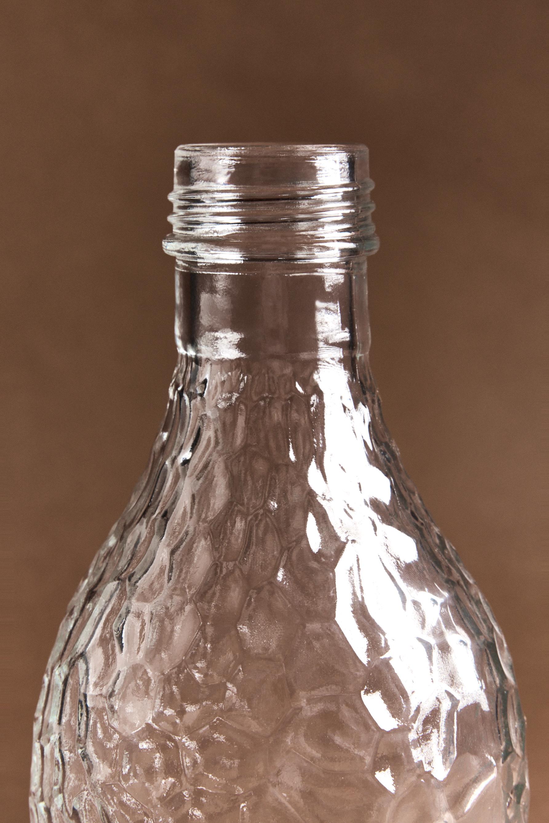 Botella vidrio efecto roca