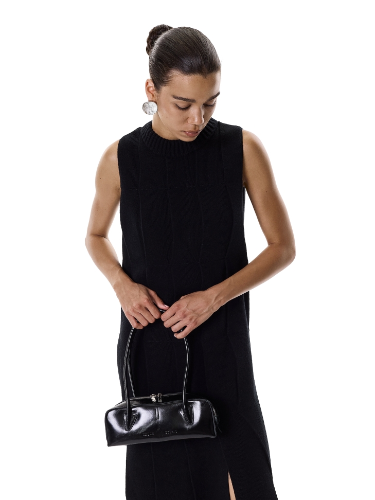 Black shoulder bag with oblong shape