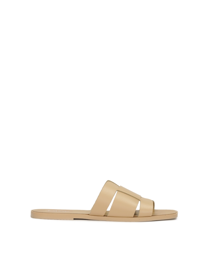 Beige natural leather slides with a minimalist design