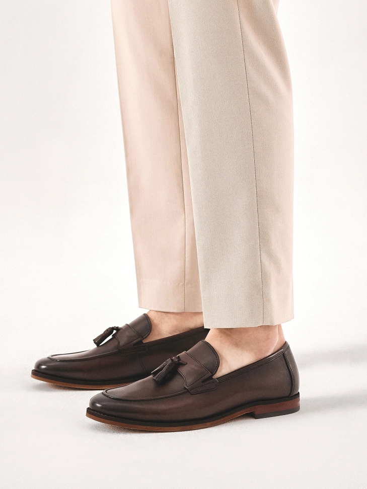 Brown leather loafers with tassels