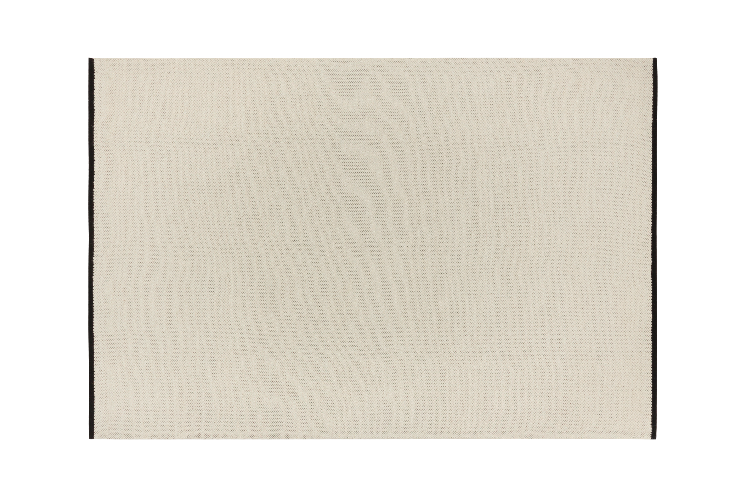 noo.ma handgeweven vloerkleed van Nieuw-Zeelandse wol, beige met Vulcano Black randaccent - rechthoekig, laagpolig 1 cm