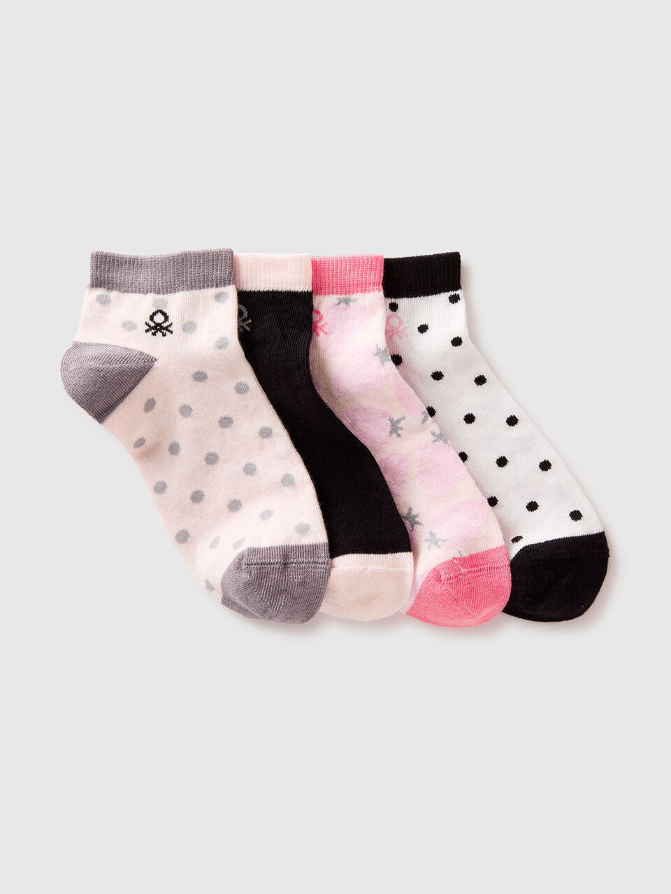 Four patterned short socks