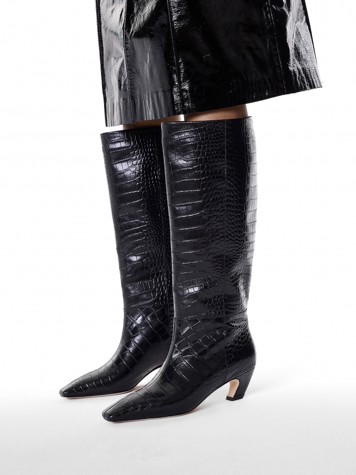 Black boots with animal motif on kitten heels