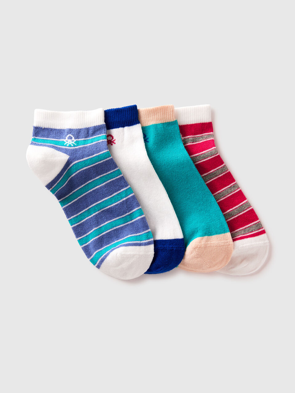Four patterned short socks