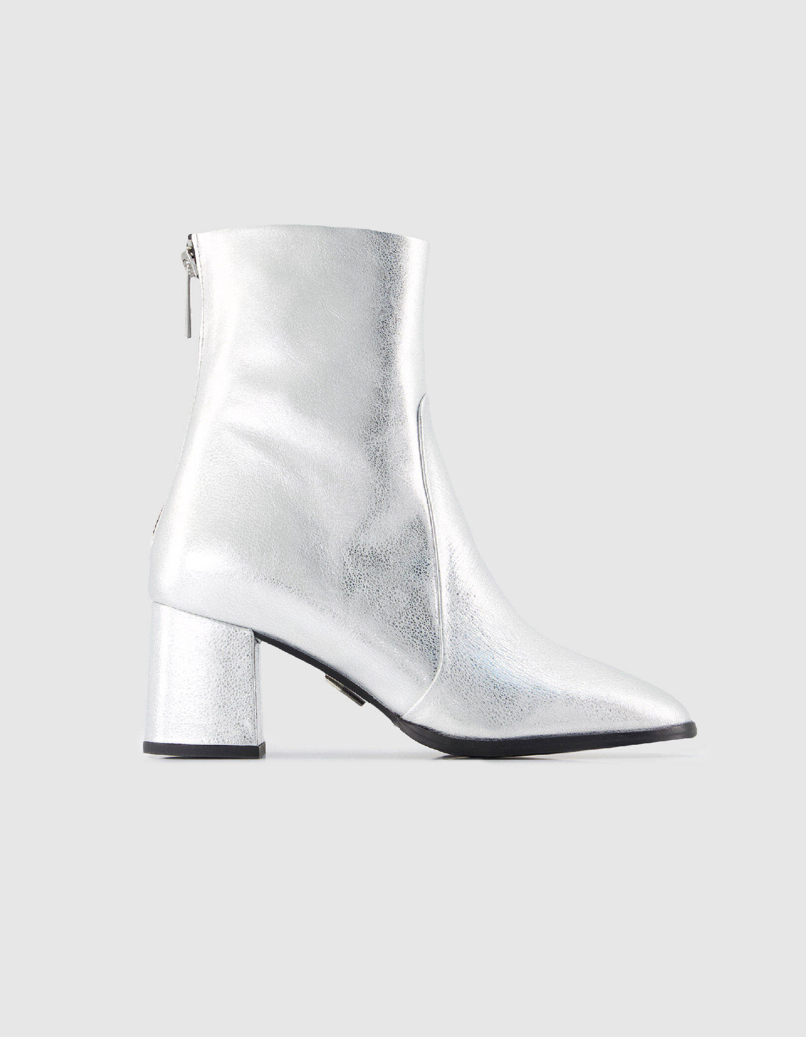 Boots à talon argentées cuir zippées Femme