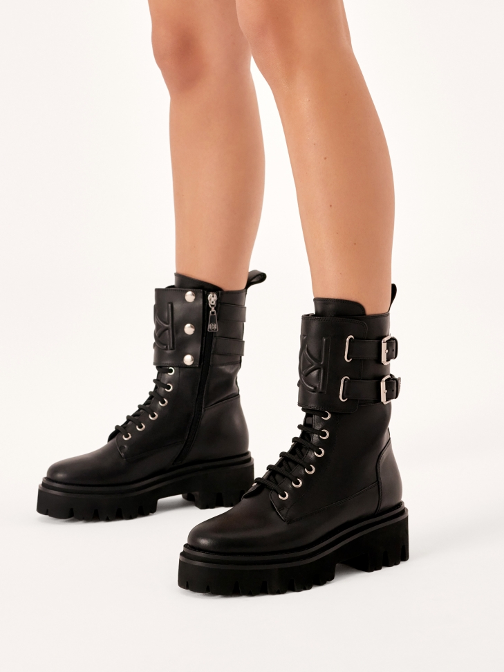 Black leather boots in military style